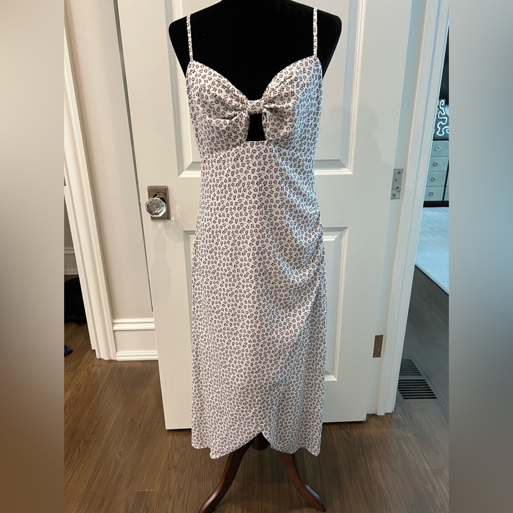 White sundress dress with black and orange flowers